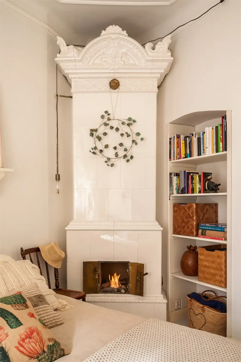 A Light-Filled Stockholm Apartment with a Charming Kitchen 22 bedroom fireplace