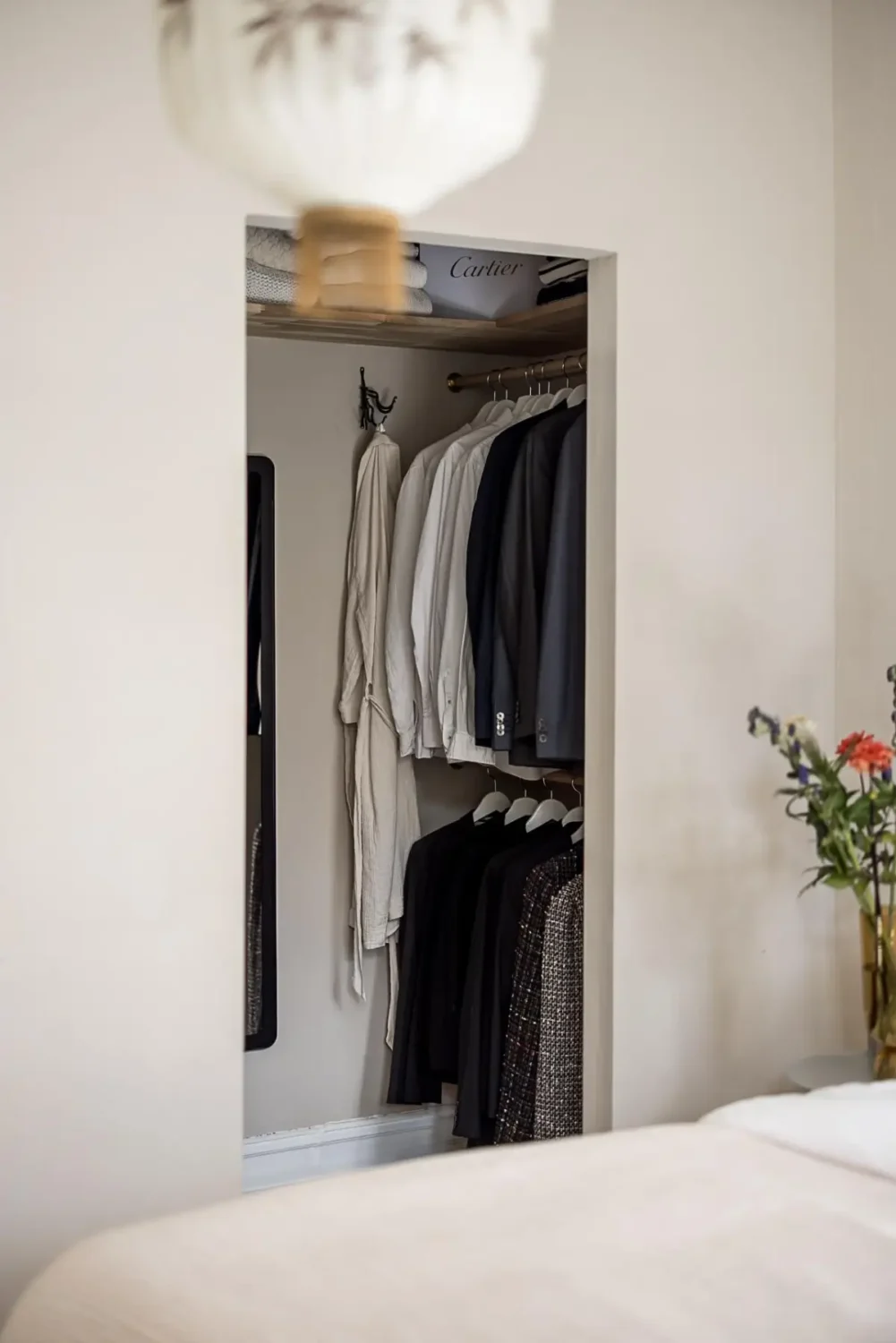 Warm Neutral Tones and Period Features in a Swedish Apartment 15 bedroom walk-in wardrobe