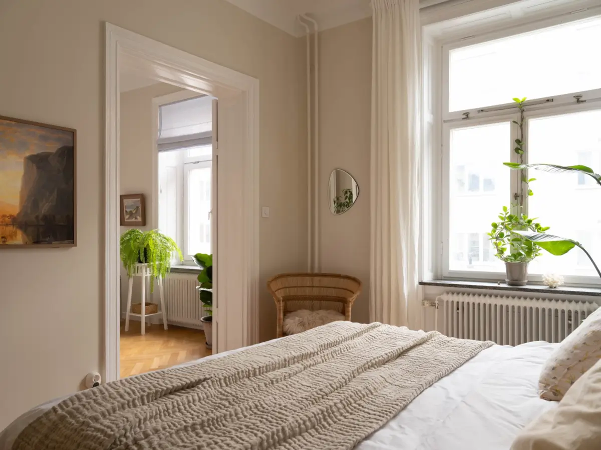 A Light and Spacious Corner Apartment in a 19th-Century Building 24 beige bedroom