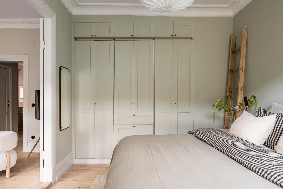 A Classic Renovated Apartment with a Social Light Green Kitchen 19 c