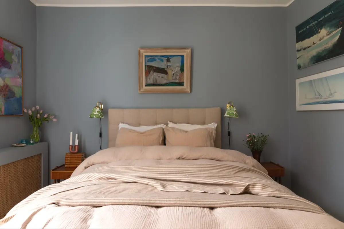 A Well-Preserved 1950s Apartment North of Stockholm 21 calm blue bedroom beige textiles