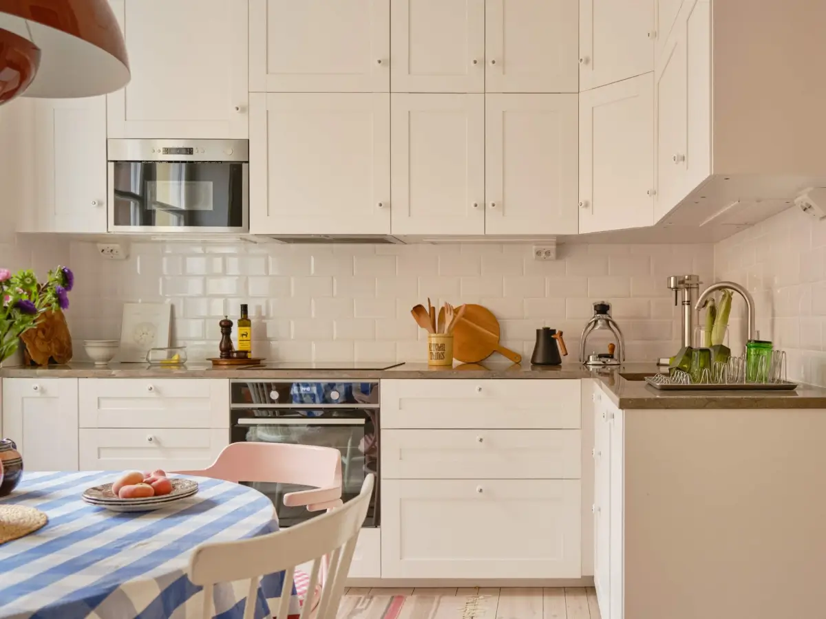 Green and Apricot Rooms in a Charming Stockholm Apartment 16 classic white kitchen