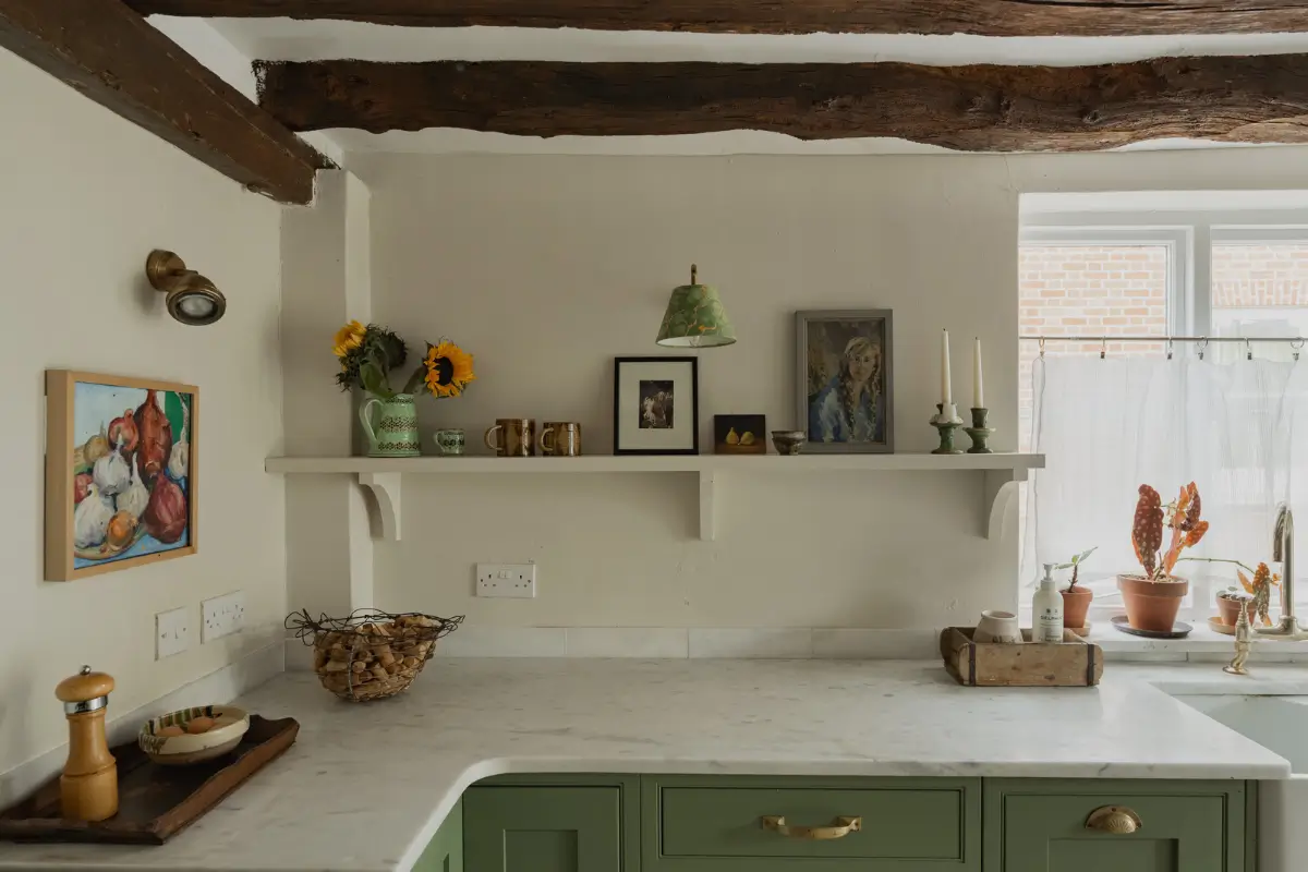 A Charming English Cottage with a Sage-Green Kitchen 7 cottage kitchen shelf exposed beams