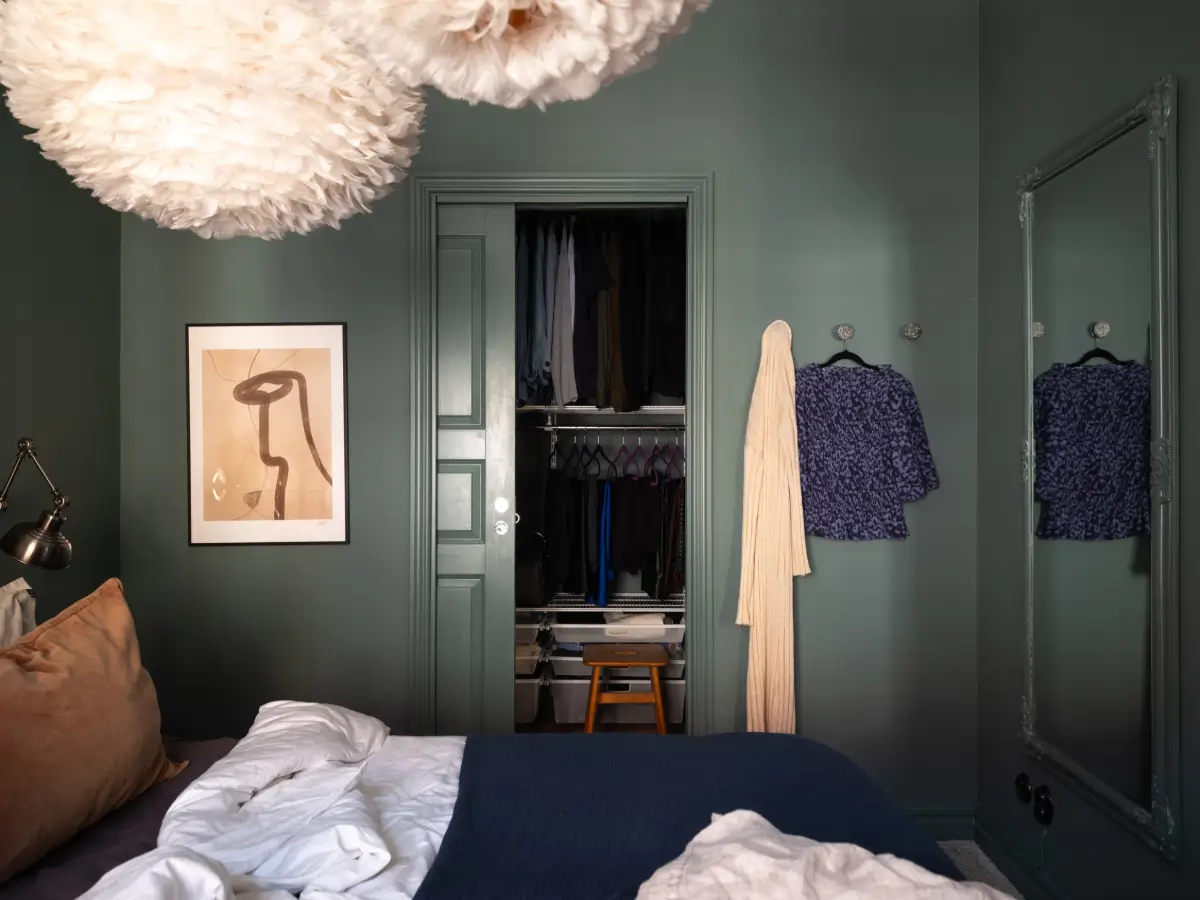 The Color Trends for 2026: A Return to Nature, Balance, and Grounding 28 dark-green-bedroom-built-in-wardrobe-color-trends-2026-nordroom