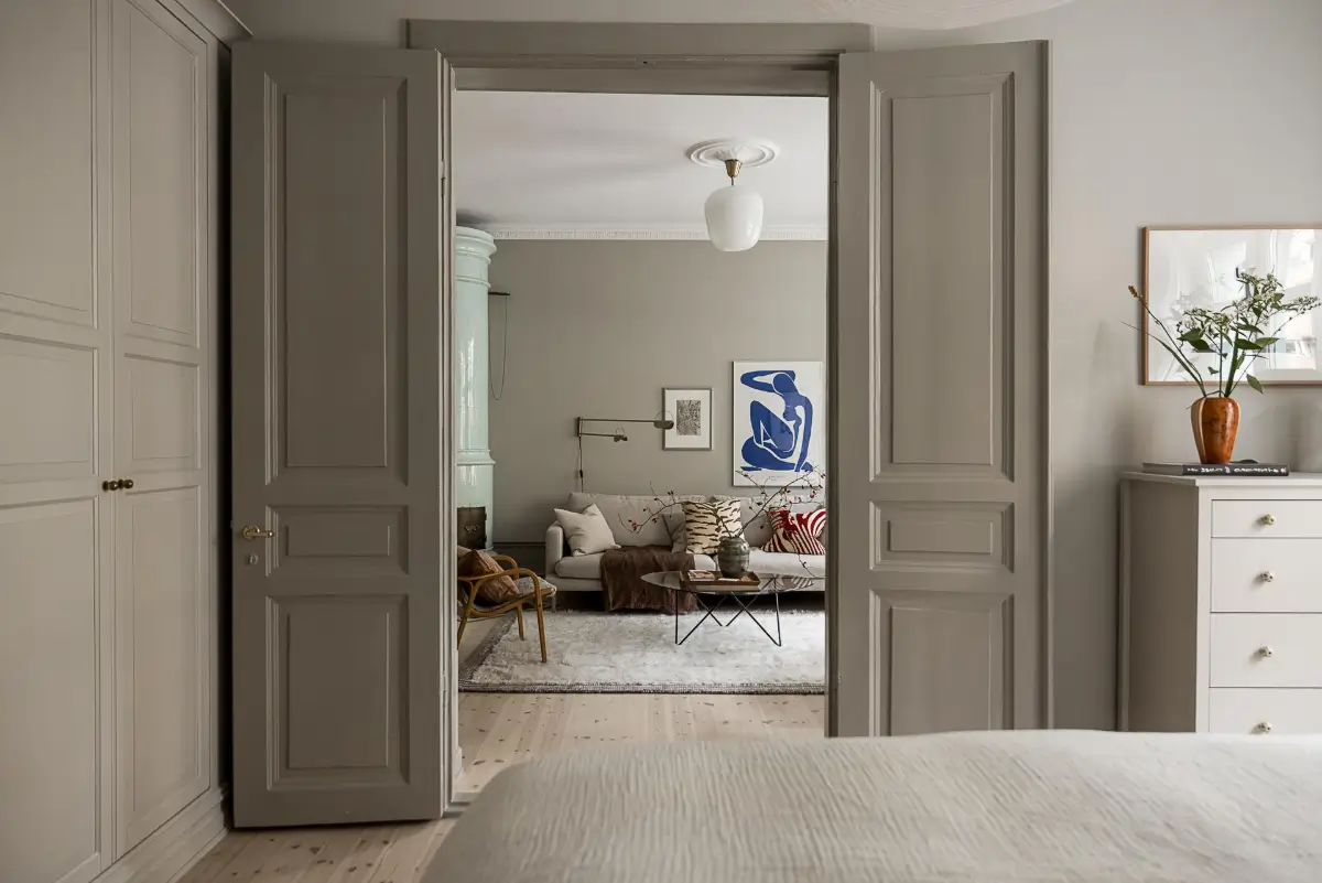 Gray Tones, Wallpapers, and a Mint Green Fireplace in a Swedish Apartment 22 double bedroom doors