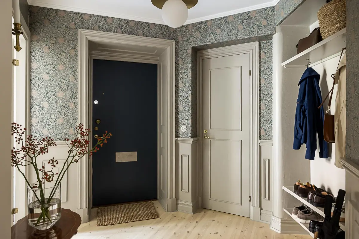 Gray Tones, Wallpapers, and a Mint Green Fireplace in a Swedish Apartment 36 entry hall william morris wallpaper Gray Tones, Wallpapers, and a Mint Green Fireplace in a Swedish Apartment