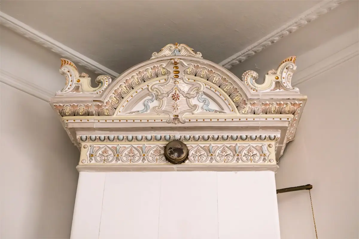 A Light-Filled Stockholm Apartment with a Charming Kitchen 14 fireplace detail