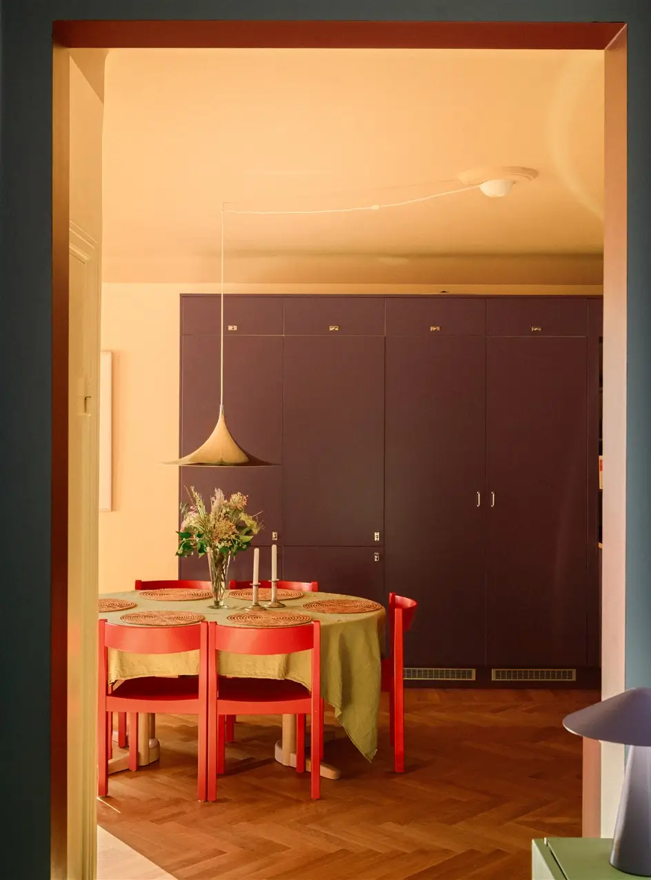 A Colorful Stockholm Family Apartment with Views of the Lake 17 floor-to-ceiling built-in cabinets dining table nordroom