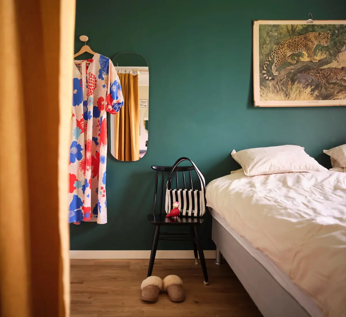 A Natural Color Palette in a Swedish 1940s Apartment 8 forest green bedroom