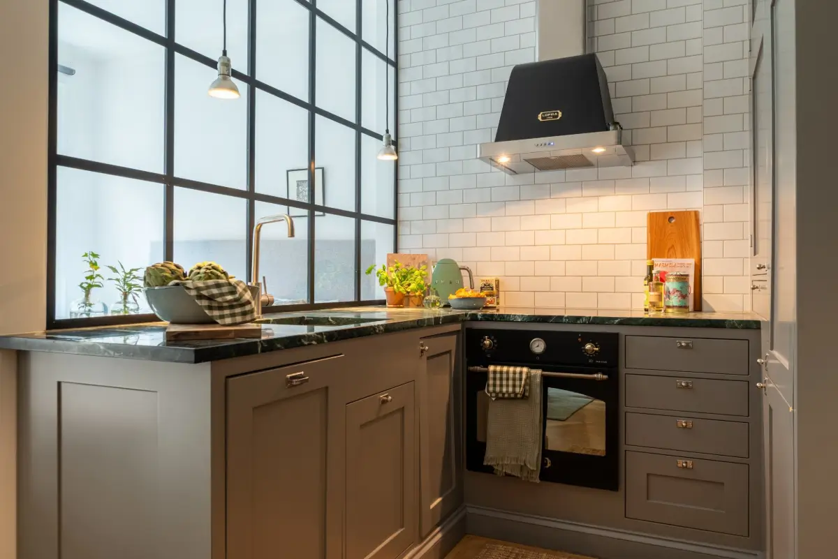 A Gray Kitchen with a Green Marble Countertop in a Small Apartment 15 gray kitchen marble countertop industrial window