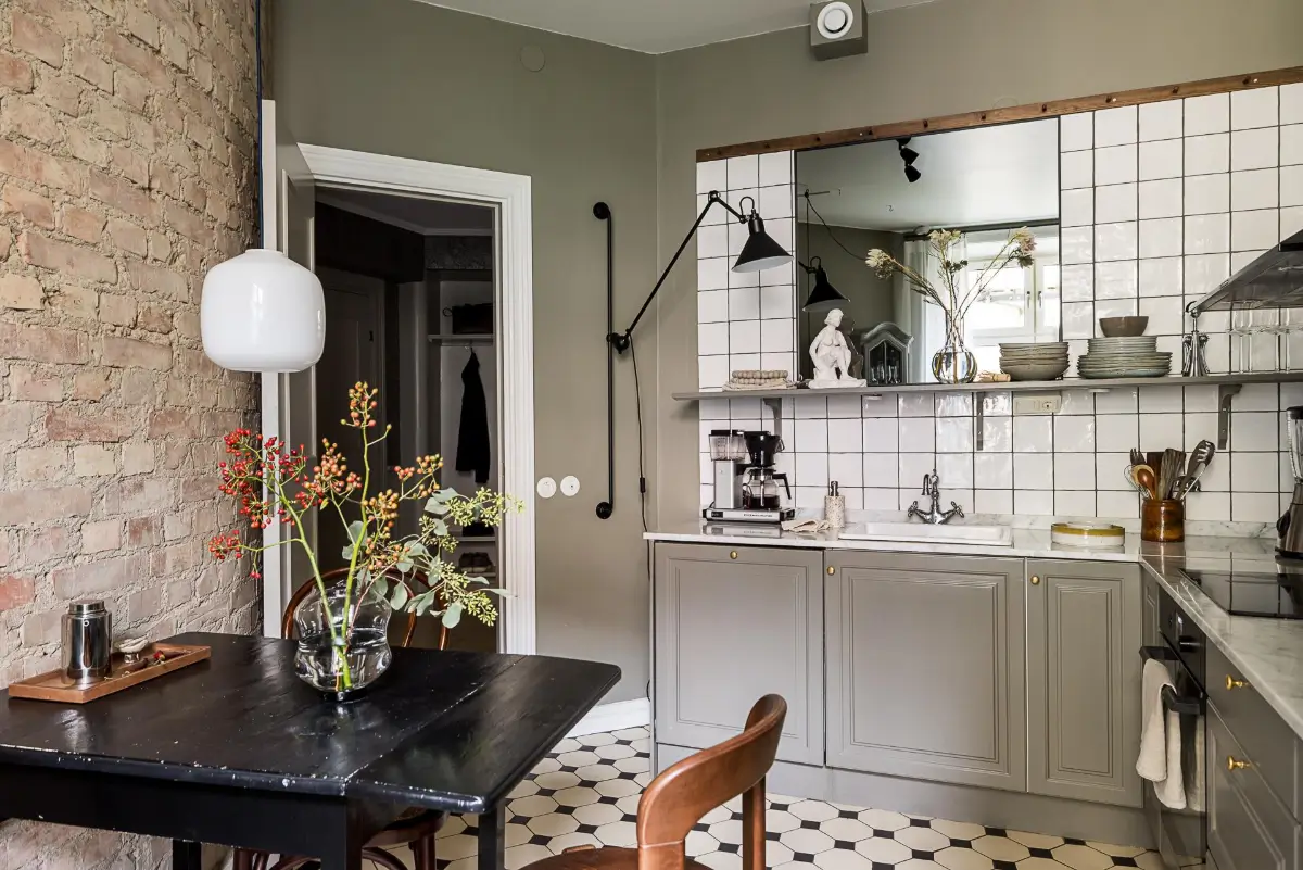 Gray Tones, Wallpapers, and a Mint Green Fireplace in a Swedish Apartment 26 gray kitchen victorian floor tiles brick wall