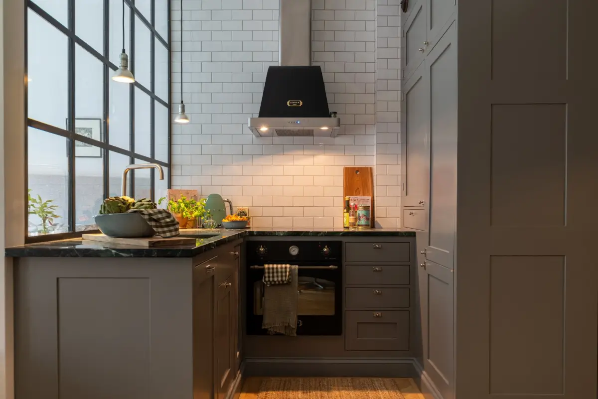 A Gray Kitchen with a Green Marble Countertop in a Small Apartment 13 gray kitchen white backsplash tiles