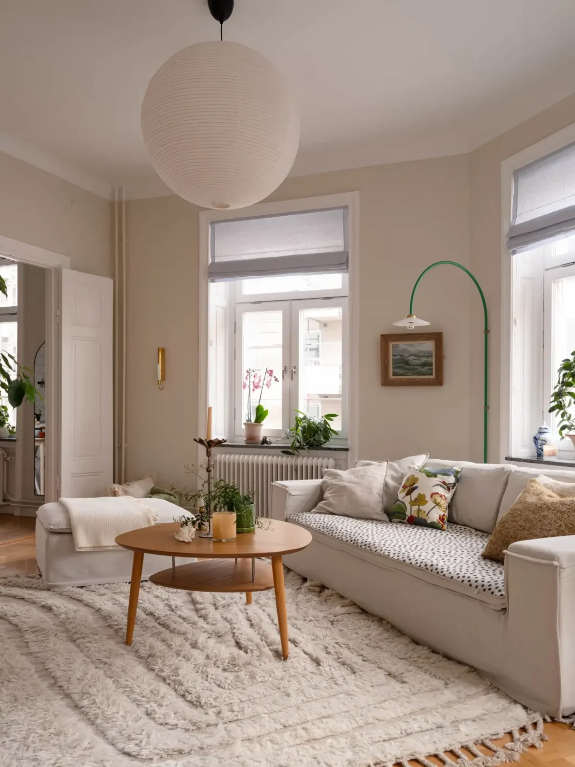 A Light and Spacious Corner Apartment in a 19th-Century Building 3 green arched wall lamp