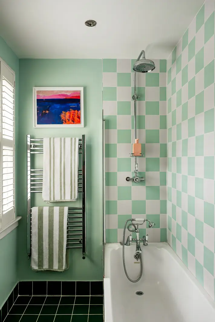 Period Elements and Subtle Color Accents in a Victorian Family Home 20 green bathroom checkerboard tiles combined shower bath