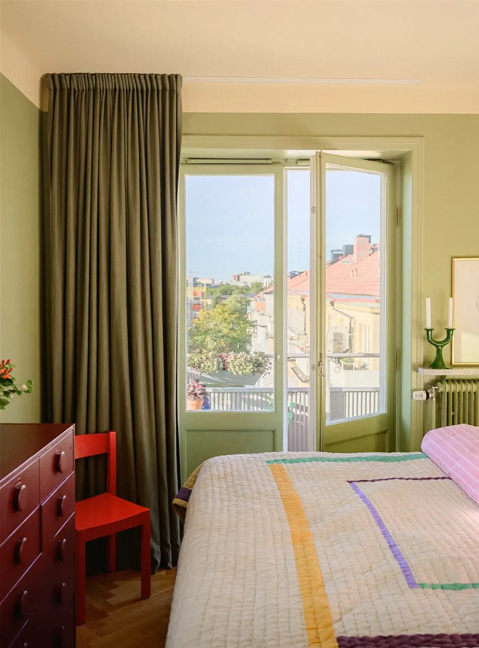 A Colorful Stockholm Family Apartment with Views of the Lake 21 green bedroom balcony doors
