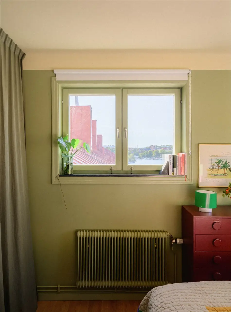 A Colorful Stockholm Family Apartment with Views of the Lake 25 green bedroom small window