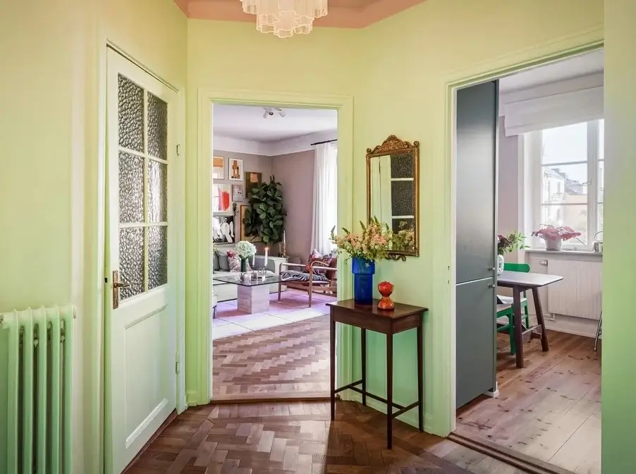 A Colorful Studio Apartment with Gucci Wallpaper 12 green hall with pink ceiling