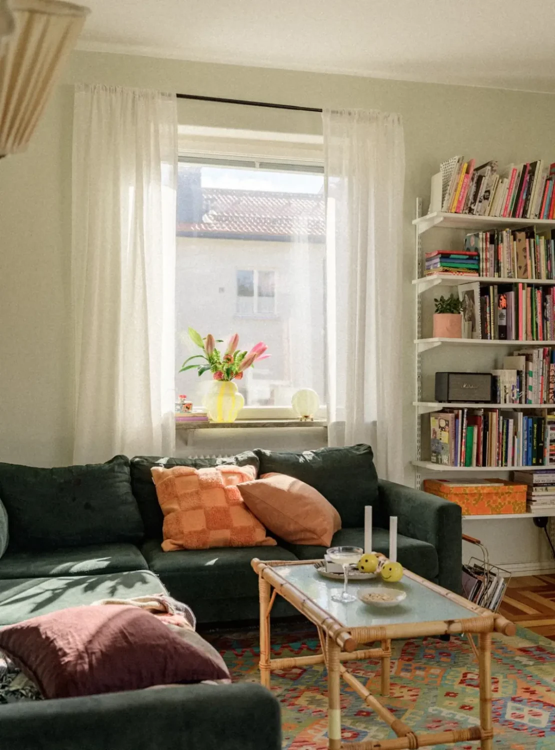 Green Tones and Period Elements in a 1940s Apartment 2 green living room sofa