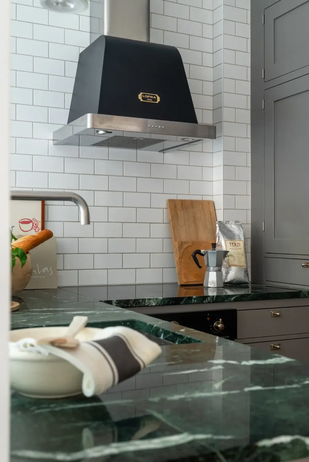 A Gray Kitchen with a Green Marble Countertop in a Small Apartment 14 green marble countertop