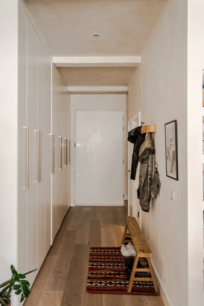 An Industrial London Apartment in a Former 1920s Shoe Factory 18 hall built-in wardrobes