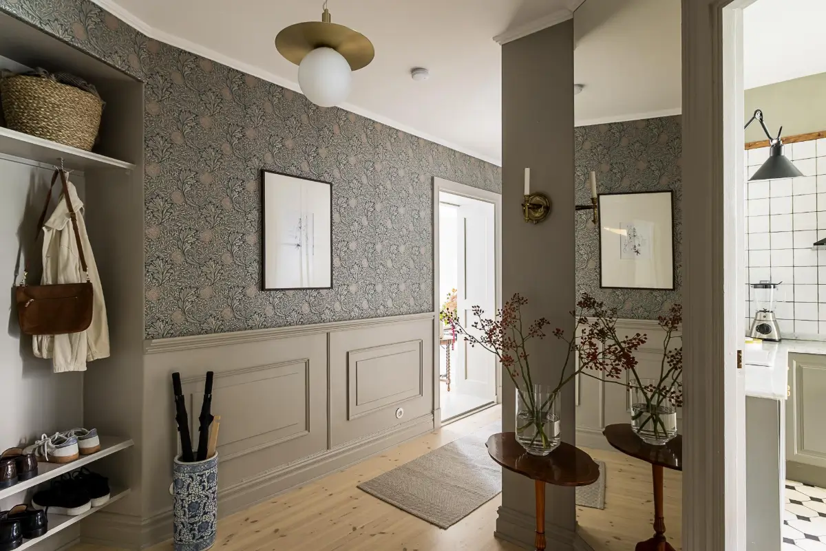 Gray Tones, Wallpapers, and a Mint Green Fireplace in a Swedish Apartment 35 hall large mirror william morris wallpaper