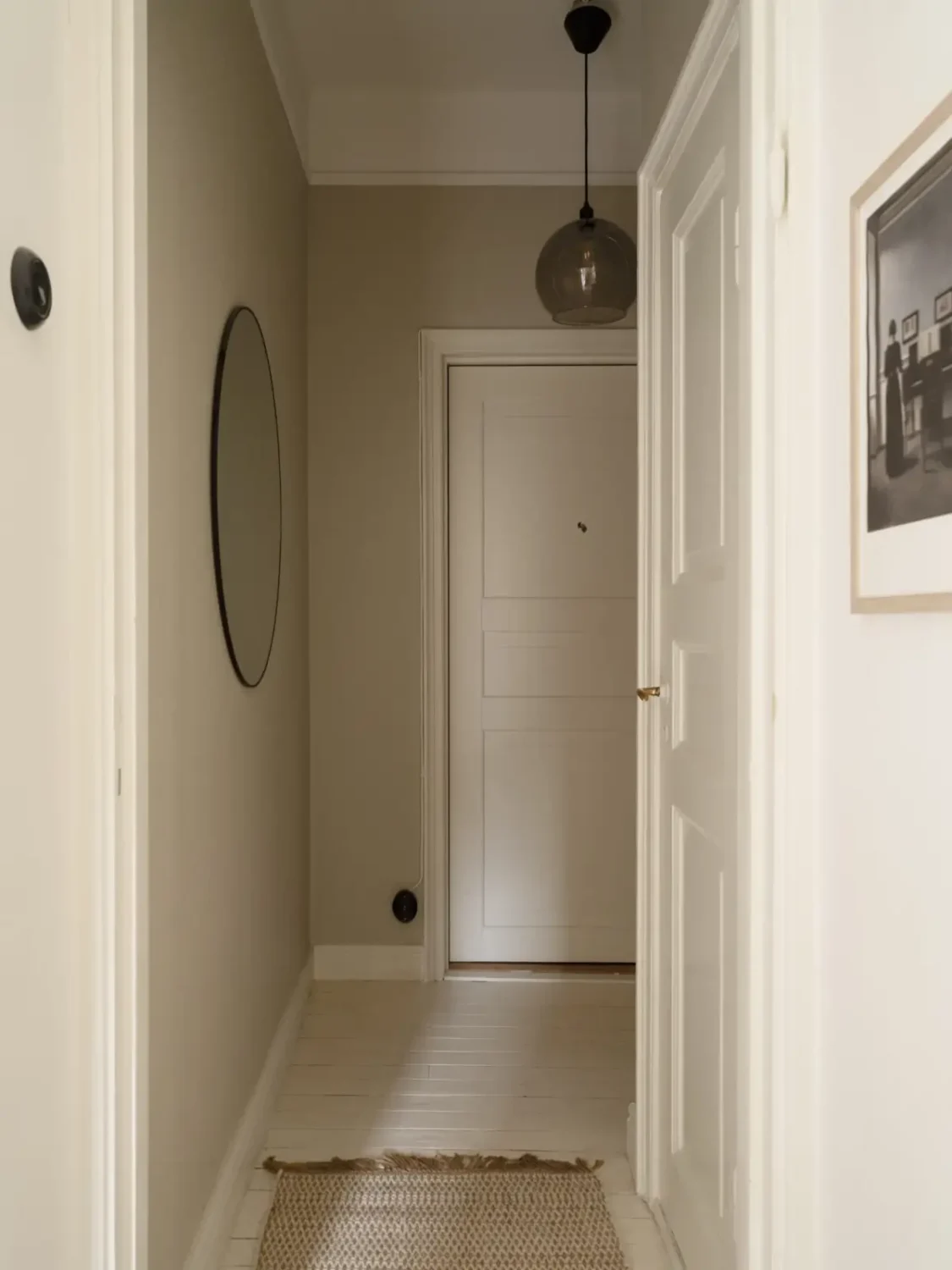 A Fresh 1920s Apartment with White Floorboards and Exposed Brick 24 hall light gray walls
