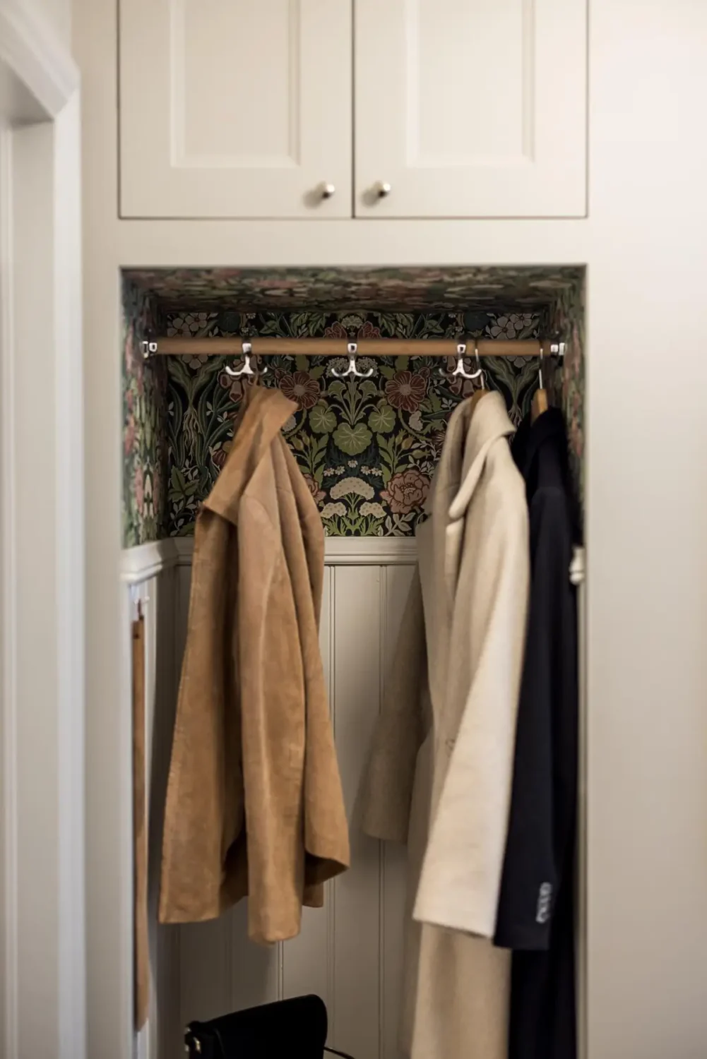 A Classic Renovated Apartment with a Social Light Green Kitchen 38 hall niche with wallpaper A Classic Renovated Apartment with a Social Light Green Kitchen