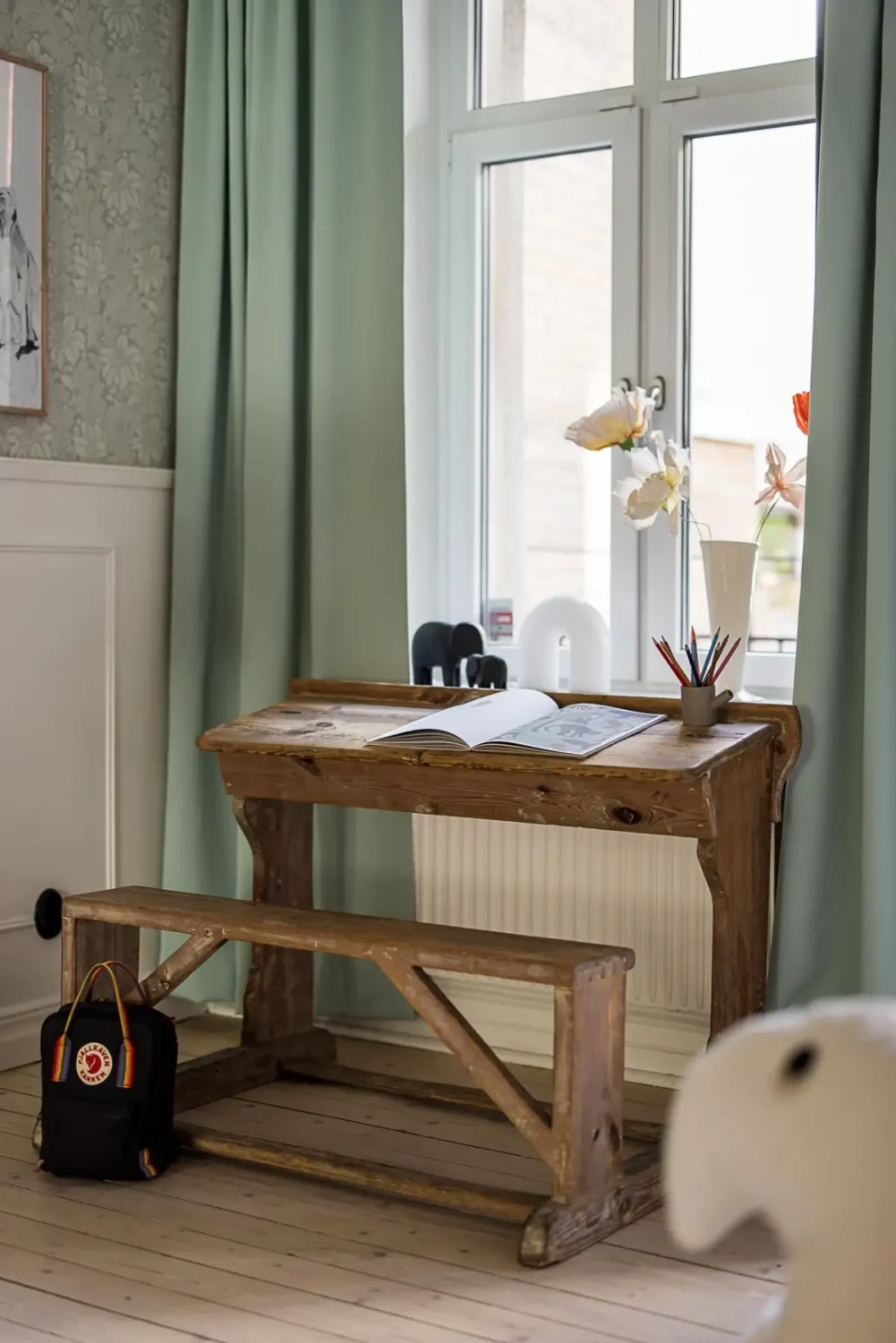 Warm Neutral Tones and Period Features in a Swedish Apartment 23 kids bedroom wooden desk