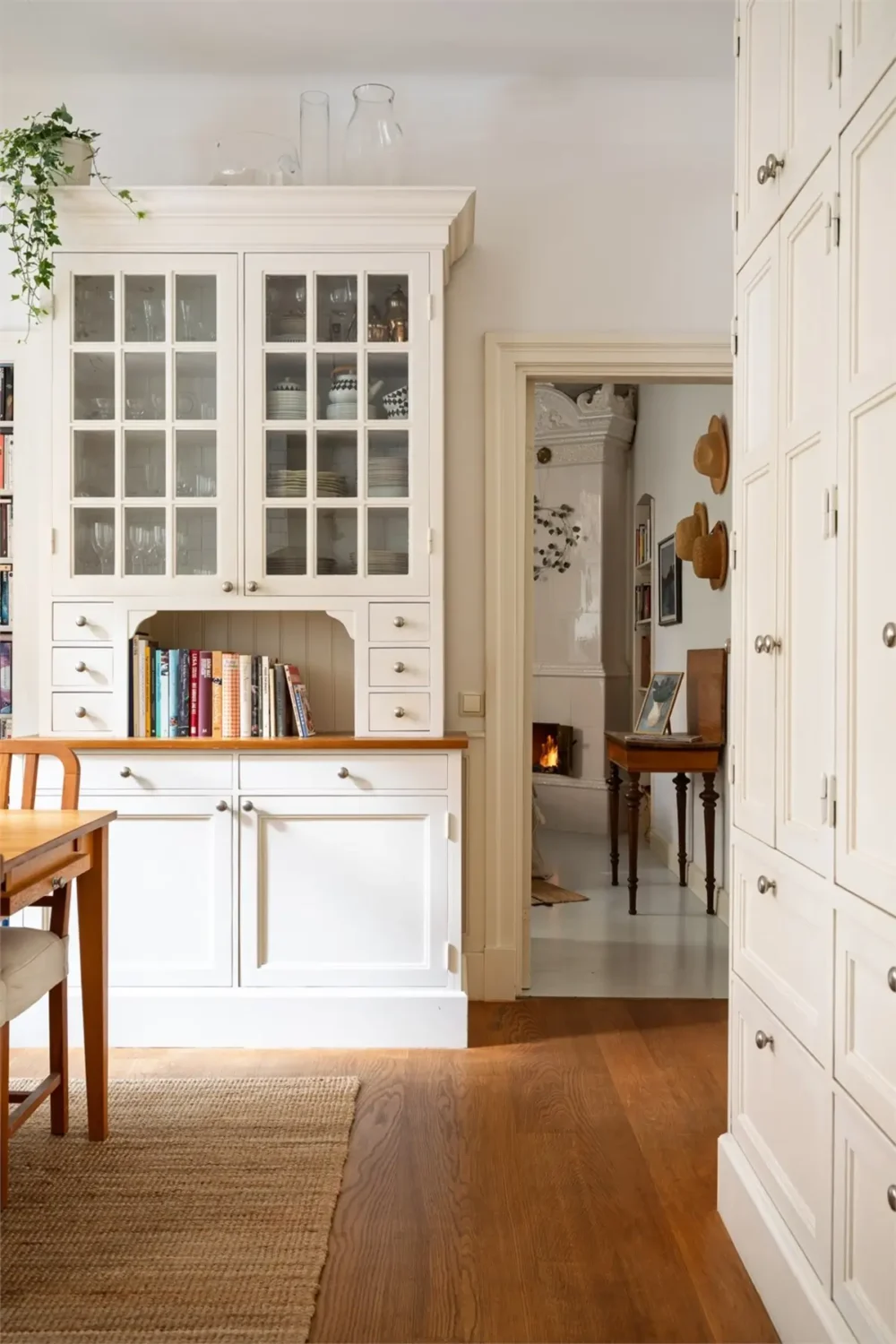 A Light-Filled Stockholm Apartment with a Charming Kitchen 8 kitchen glass cabinets