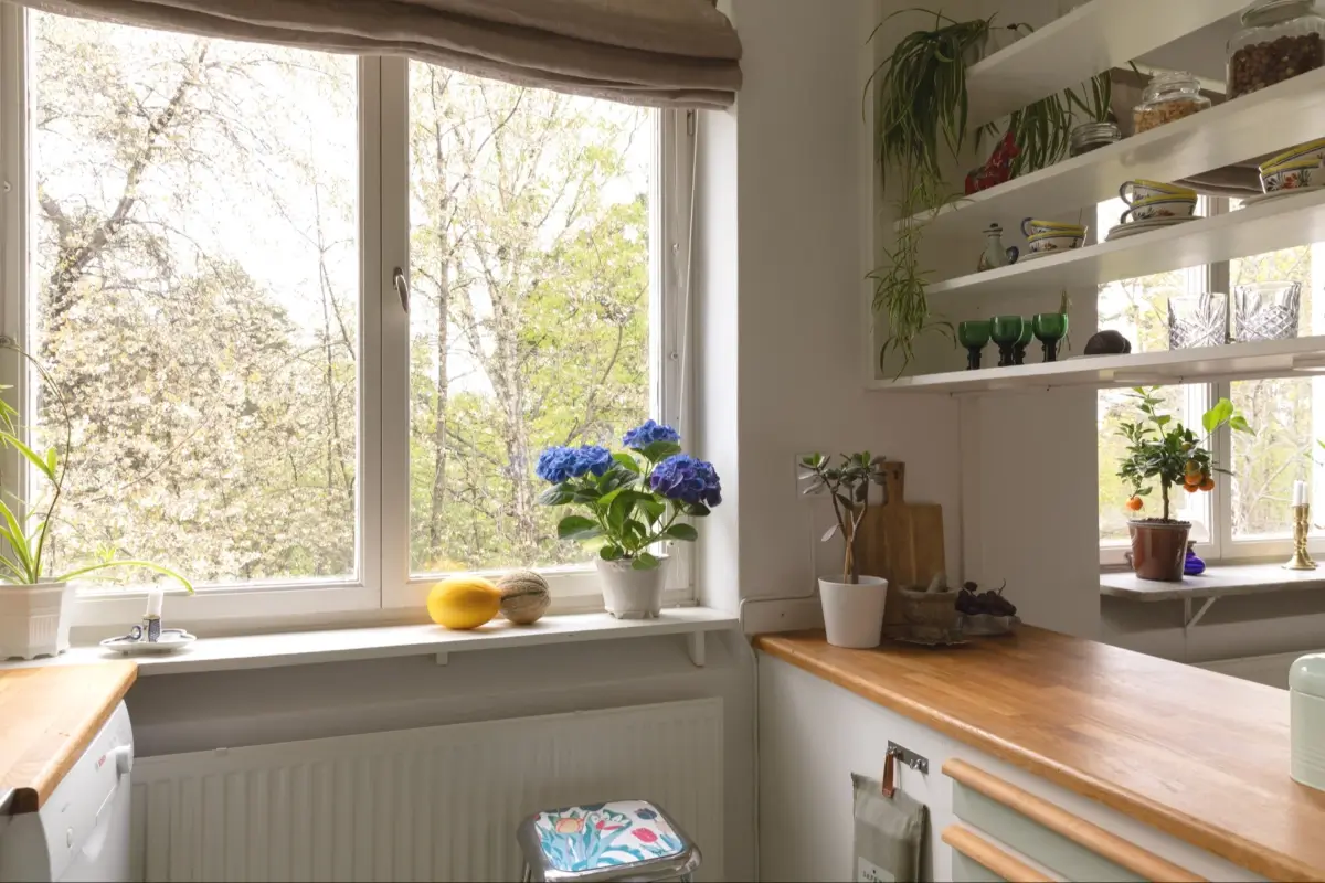 A Well-Preserved 1950s Apartment North of Stockholm 14 kitchen opening with shelves
