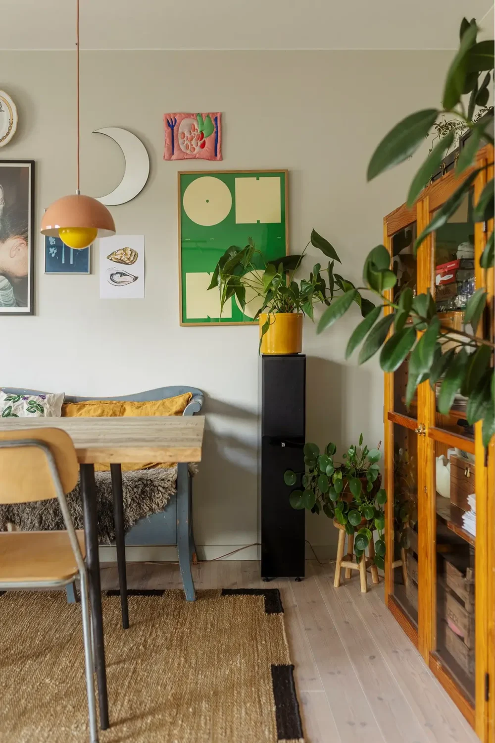 A Charming 1960s Family Home in Stockholm 4 kitchen table blue wooden bench