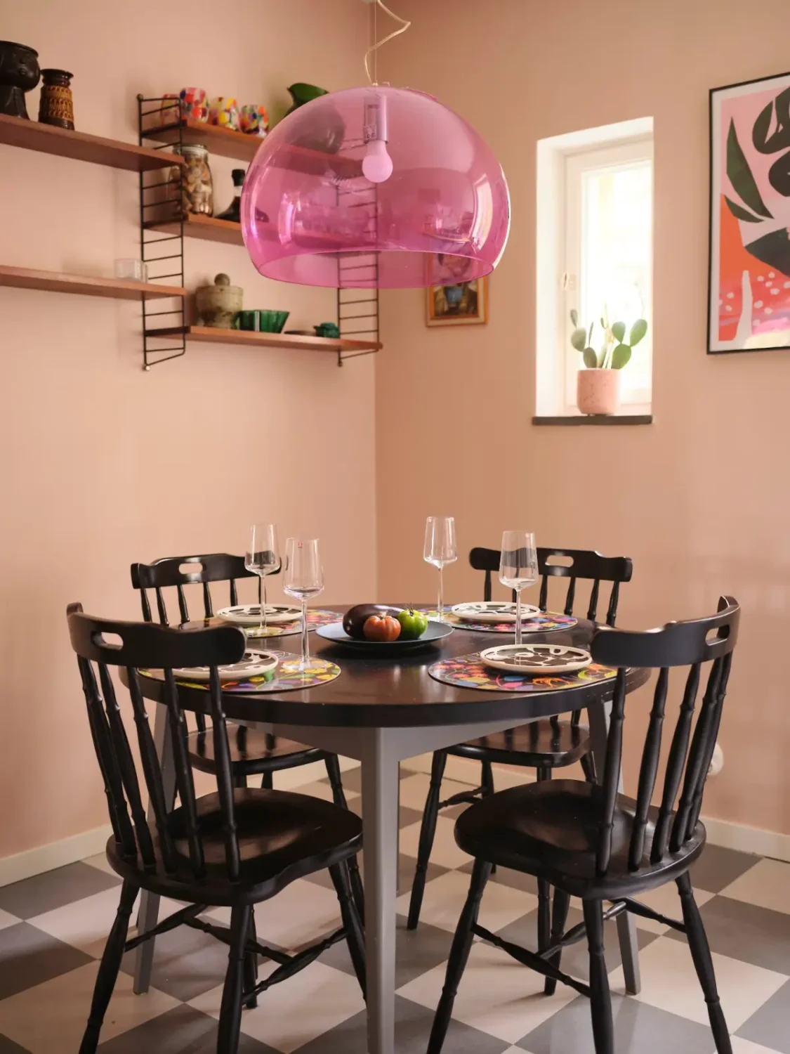 A Natural Color Palette in a Swedish 1940s Apartment 17 kitchen table pink pendant