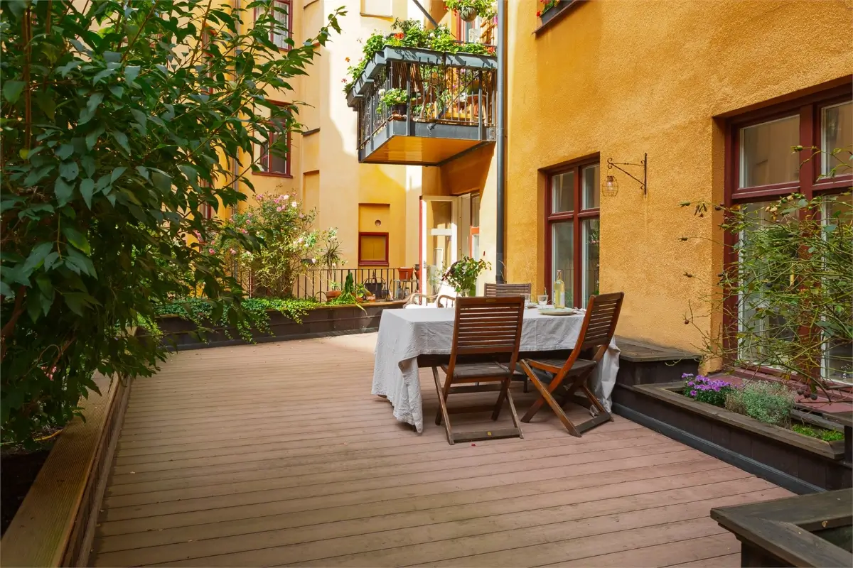 A Light-Filled Stockholm Apartment with a Charming Kitchen 26 large courtyard terrace