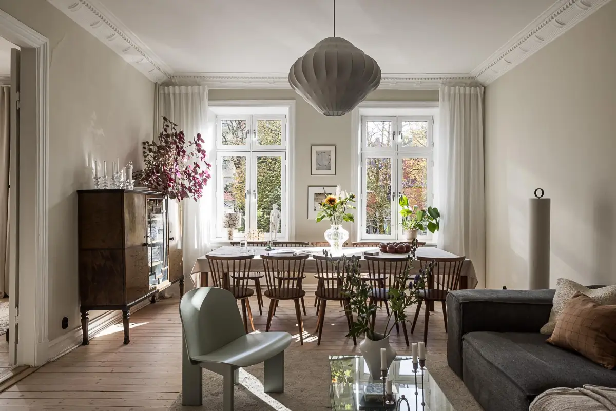 Warm Neutral Tones and Period Features in a Swedish Apartment 2 large dining table