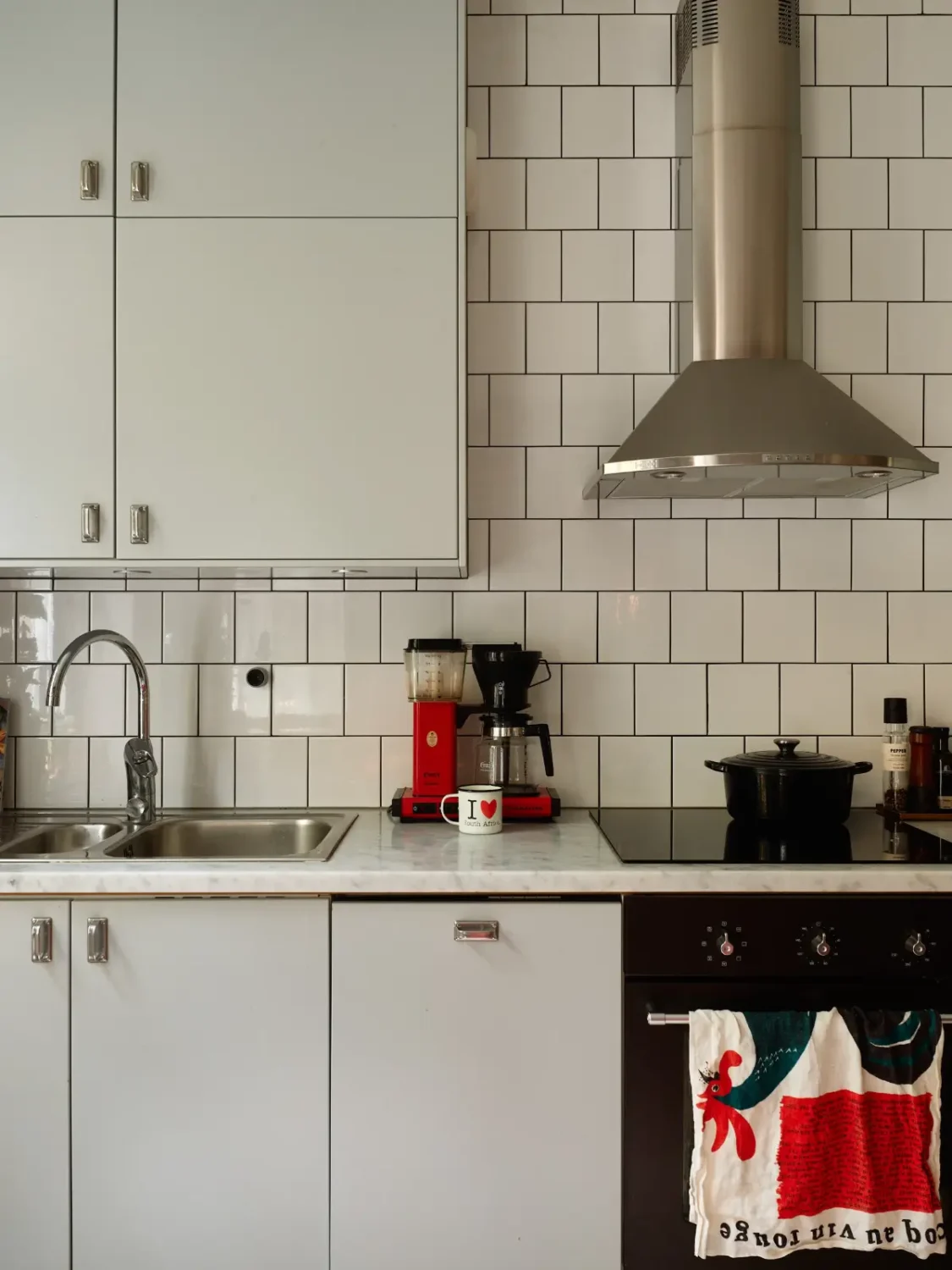A Well-Planned Family Apartment with Historic Character 16 light gray kitchen cabinets