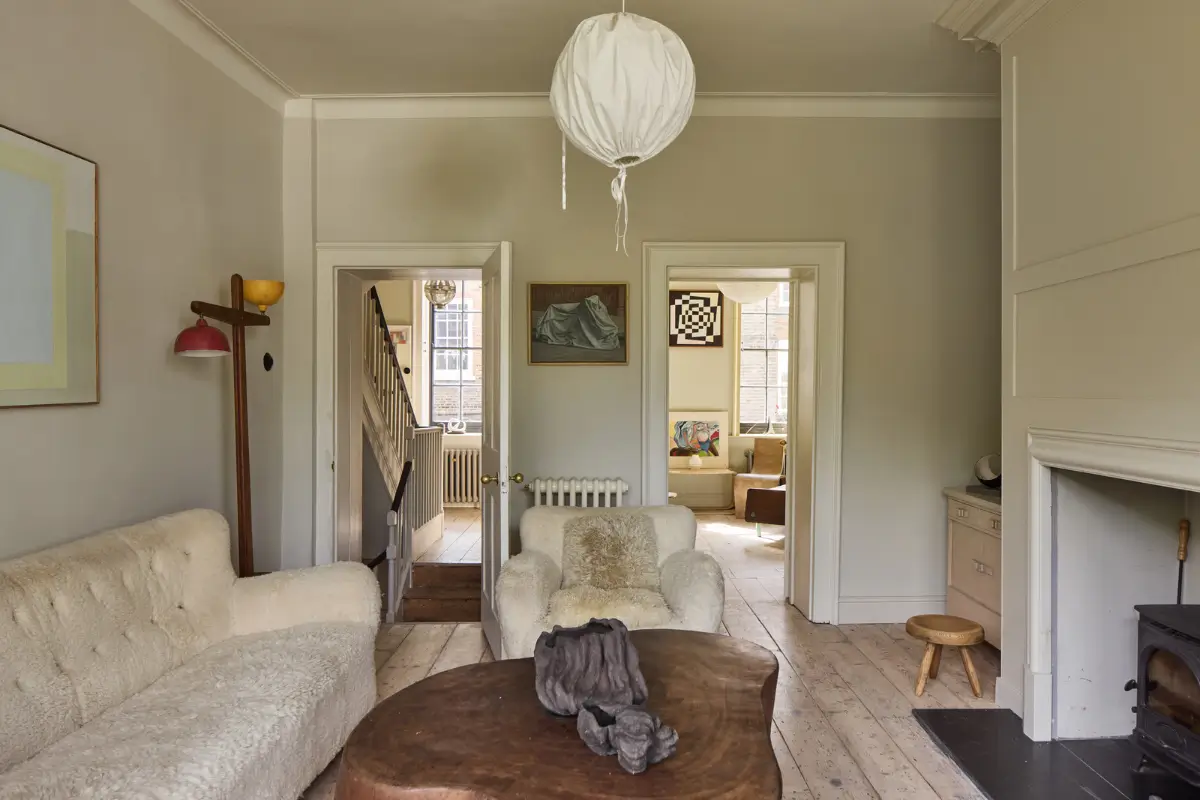 A deVOL Kitchen in a Beautiful Restored Georgian Townhouse in London 14 light living room teddy sofa rustic floorboards