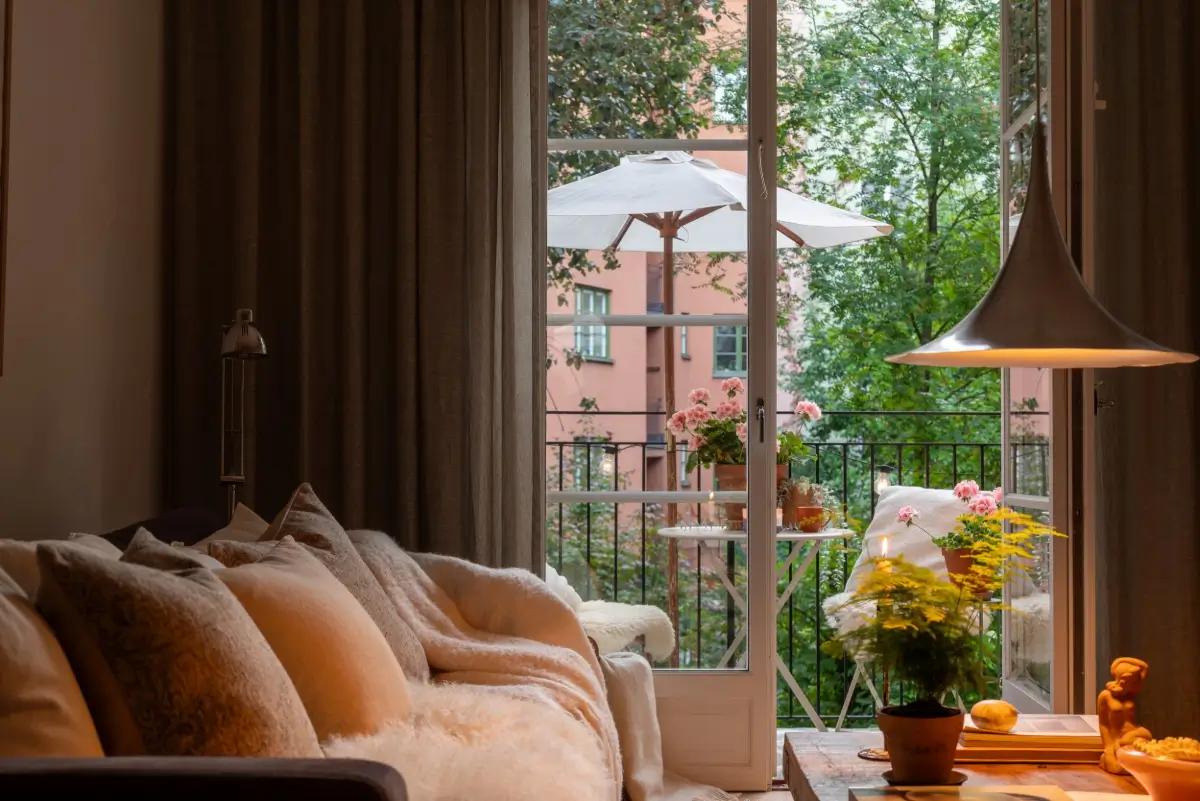 A Gray Kitchen with a Green Marble Countertop in a Small Apartment 9 living room at night