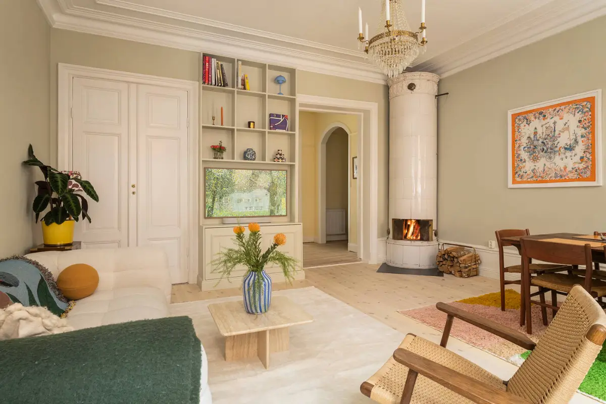 living room beige walls built-in television cabinet fireplace