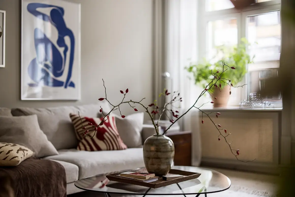 Gray Tones, Wallpapers, and a Mint Green Fireplace in a Swedish Apartment 5 living room detail