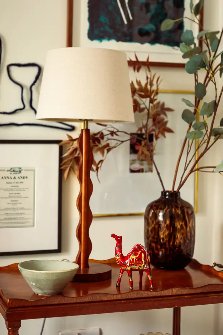 Period Elements and Subtle Color Accents in a Victorian Family Home 7 living room detail side table