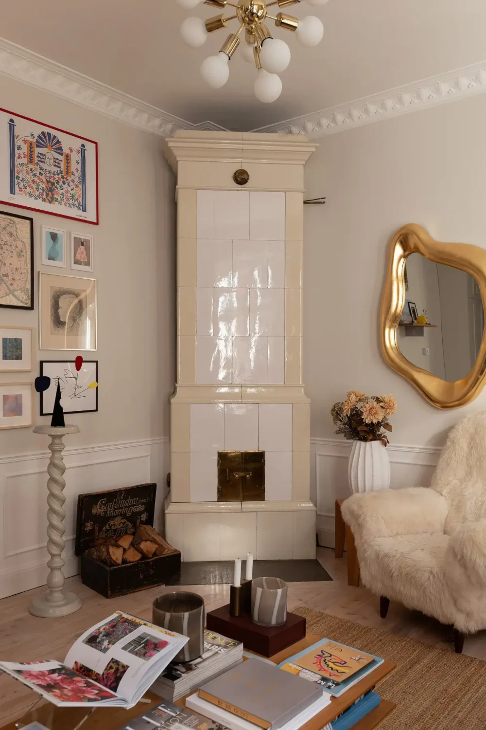 Neutral Tones and Period Character from the 1910s in a Stockholm Apartment 5 living room fireplace