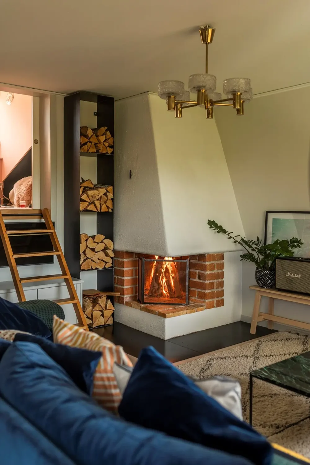 A Charming 1960s Family Home in Stockholm 12 living room fireplace