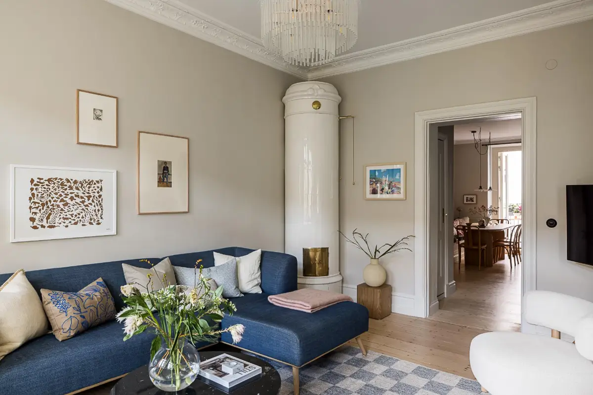 A Classic Renovated Apartment with a Social Light Green Kitchen 5 living room fireplace