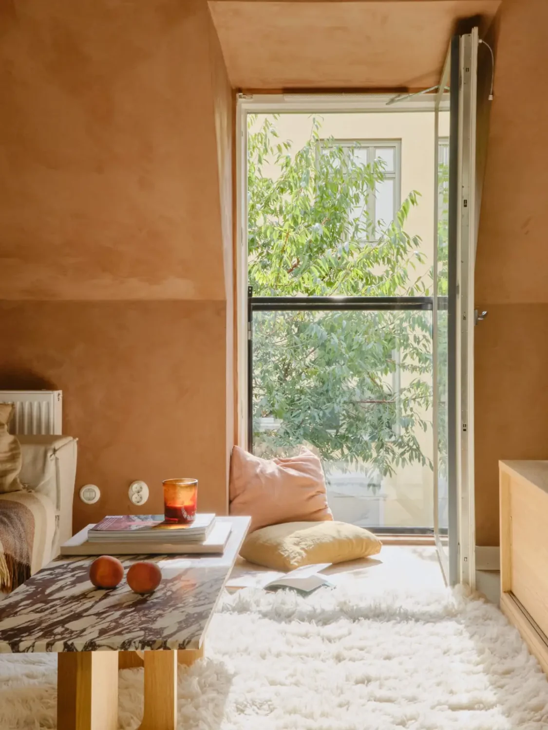 Former Stables Transformed into a Modern, Light House with Plaster Walls 12 living room french balcony