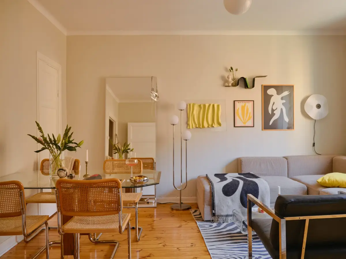 A Light 1930s Apartment with a Bubblegum Pink Bedroom 6 living room glass dining table large mirror