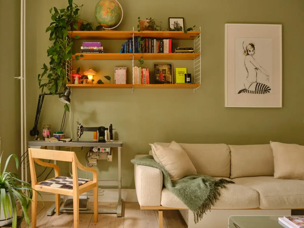 Green and Apricot Rooms in a Charming Stockholm Apartment 4 living room green walls