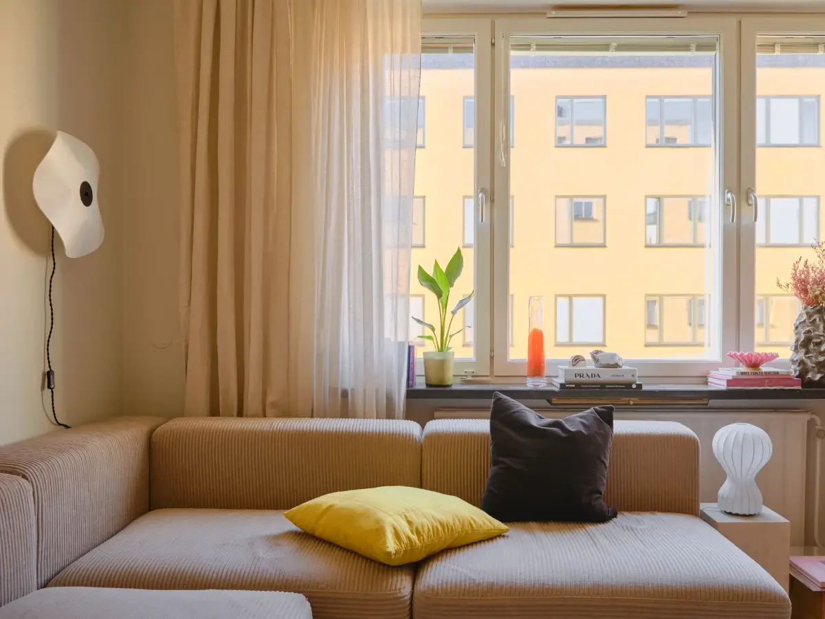 A Light 1930s Apartment with a Bubblegum Pink Bedroom 7 living room sofa