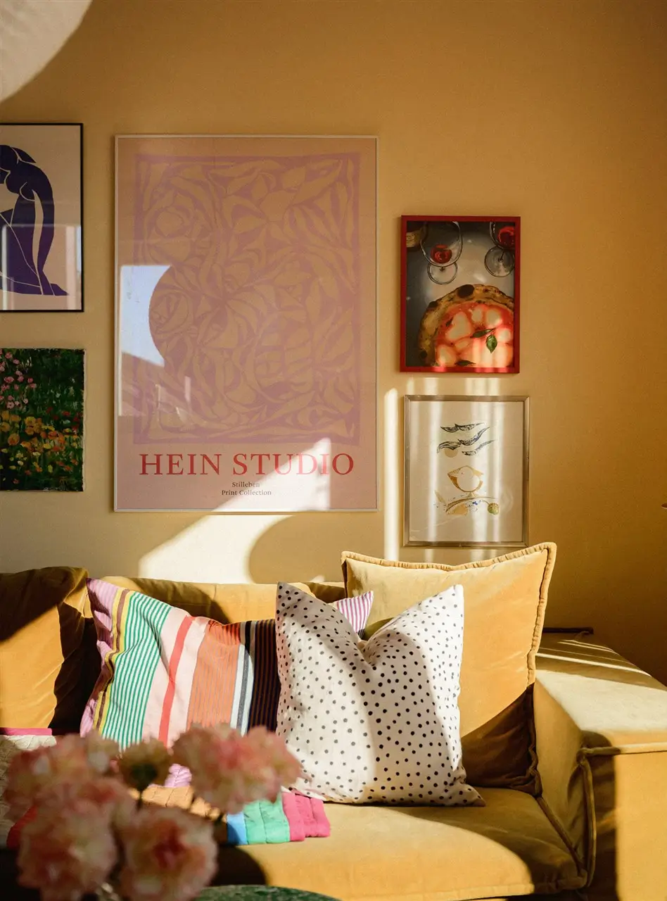 A Colorful Stockholm Family Apartment with Views of the Lake 3 living room sofa gallery wall