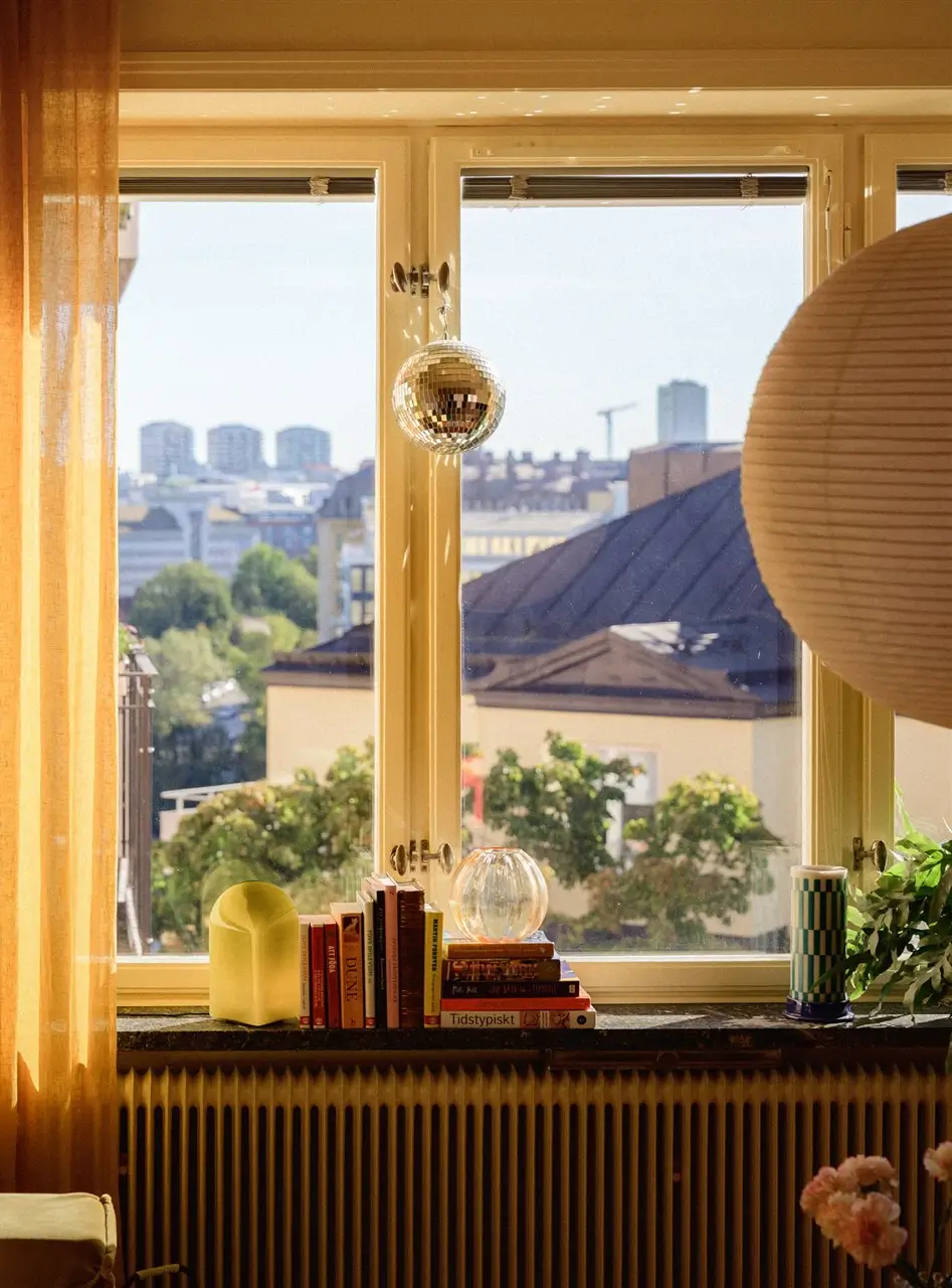 A Colorful Stockholm Family Apartment with Views of the Lake 4 living room window