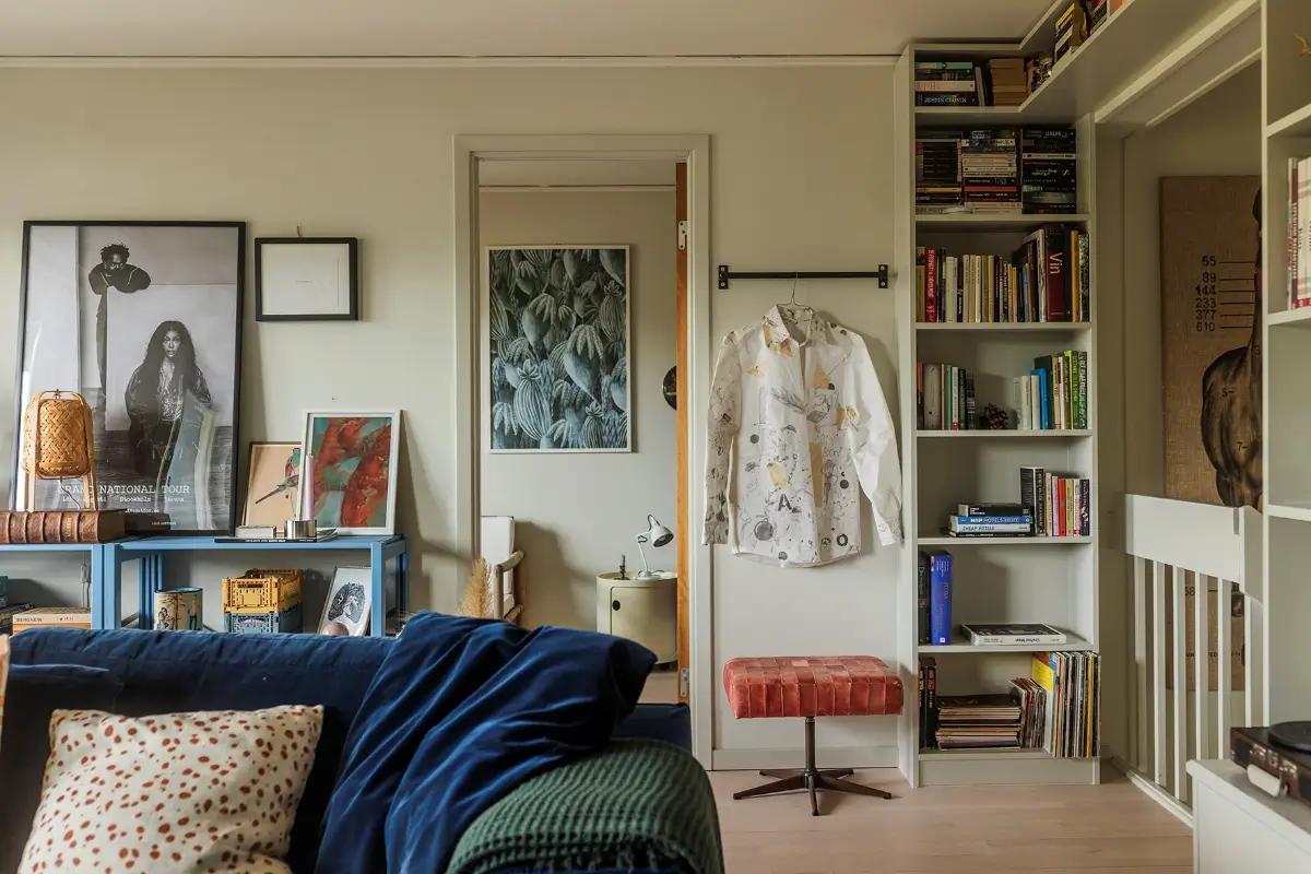 A Charming 1960s Family Home in Stockholm 18 living room with blue sofa
